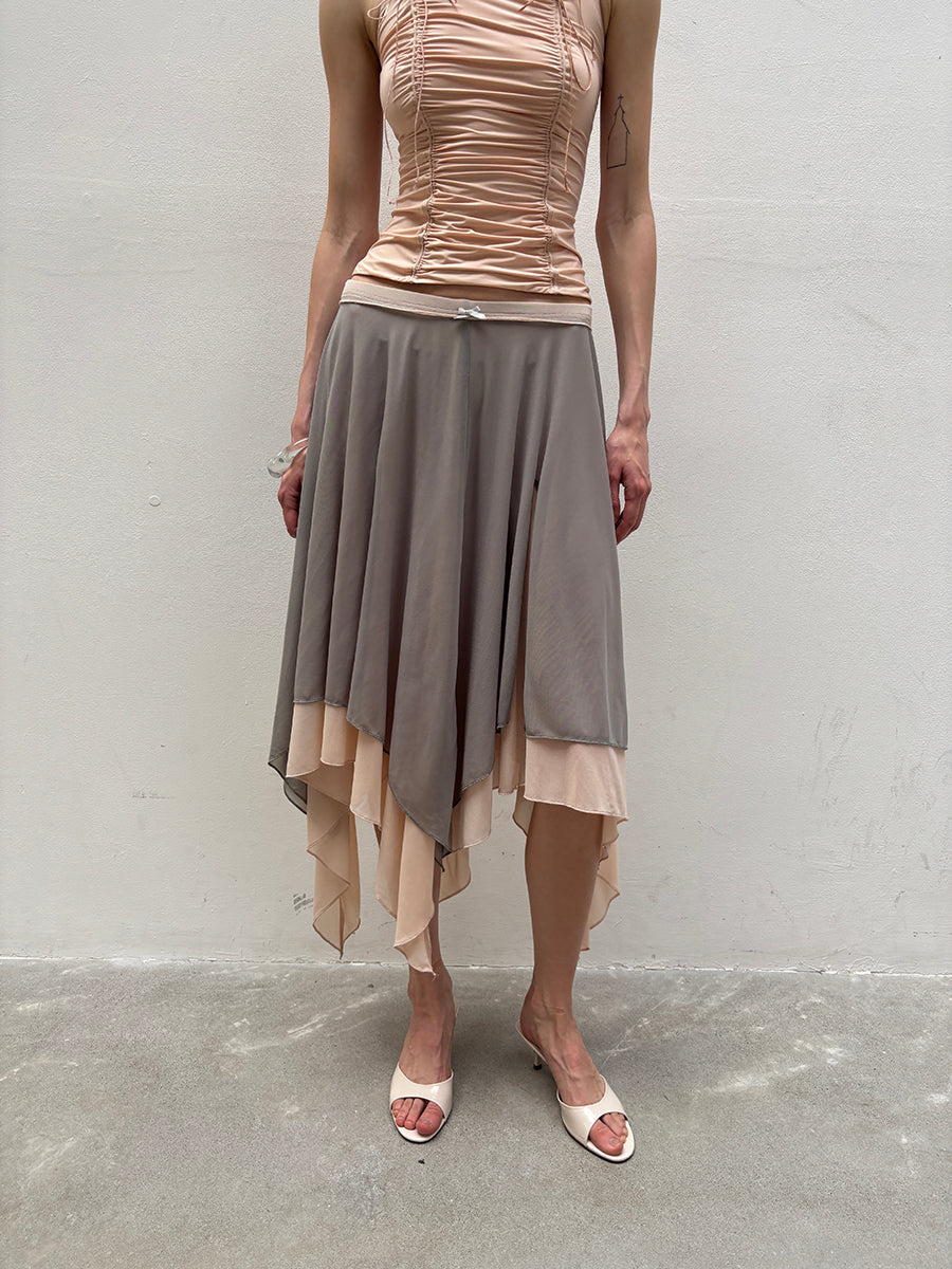 Dotyears Mesh panels contrast with fluttery maxi skirts