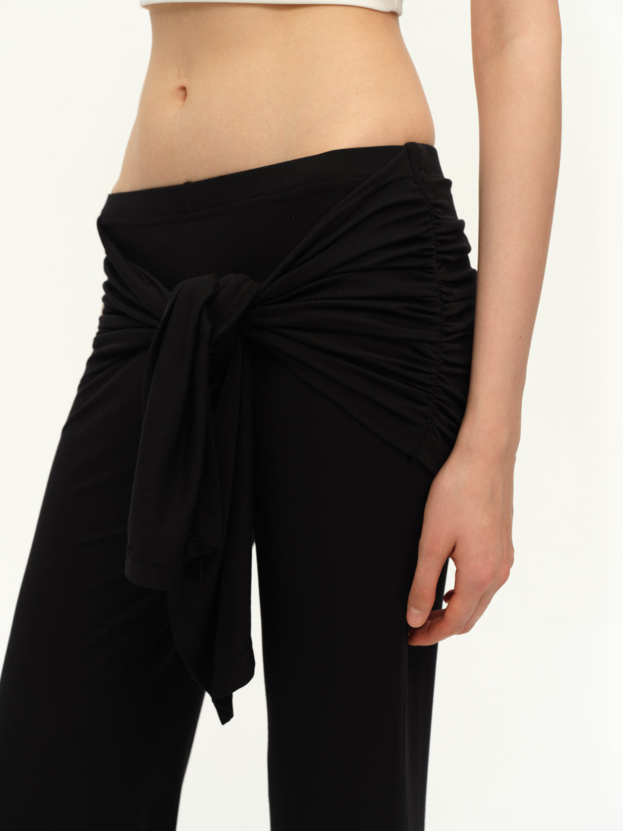Dotyears Straight-leg black knit pants with a lace-up design