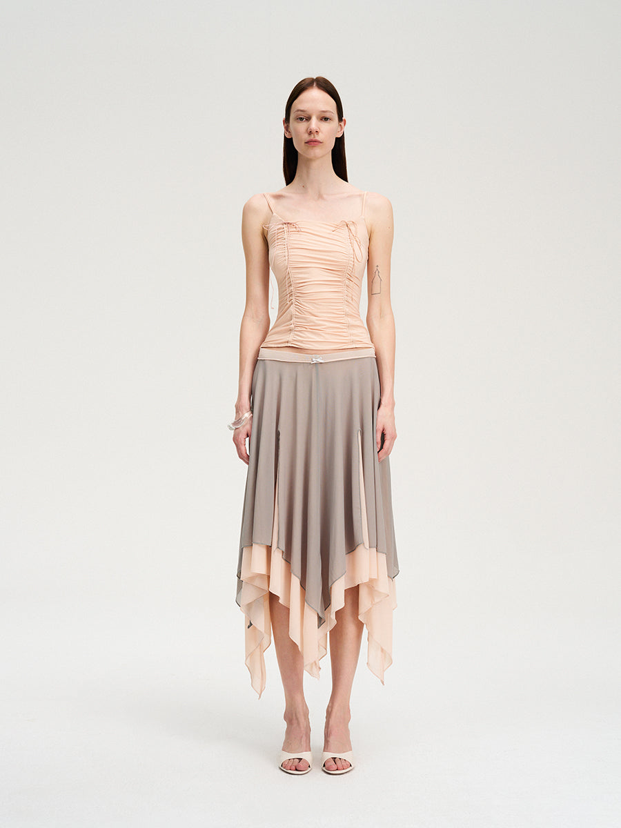 Dotyears Mesh panels contrast with fluttery maxi skirts