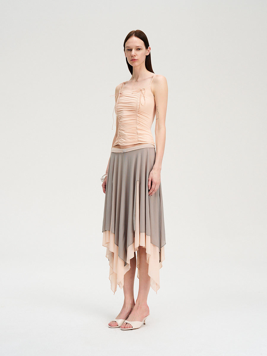 Dotyears Mesh panels contrast with fluttery maxi skirts