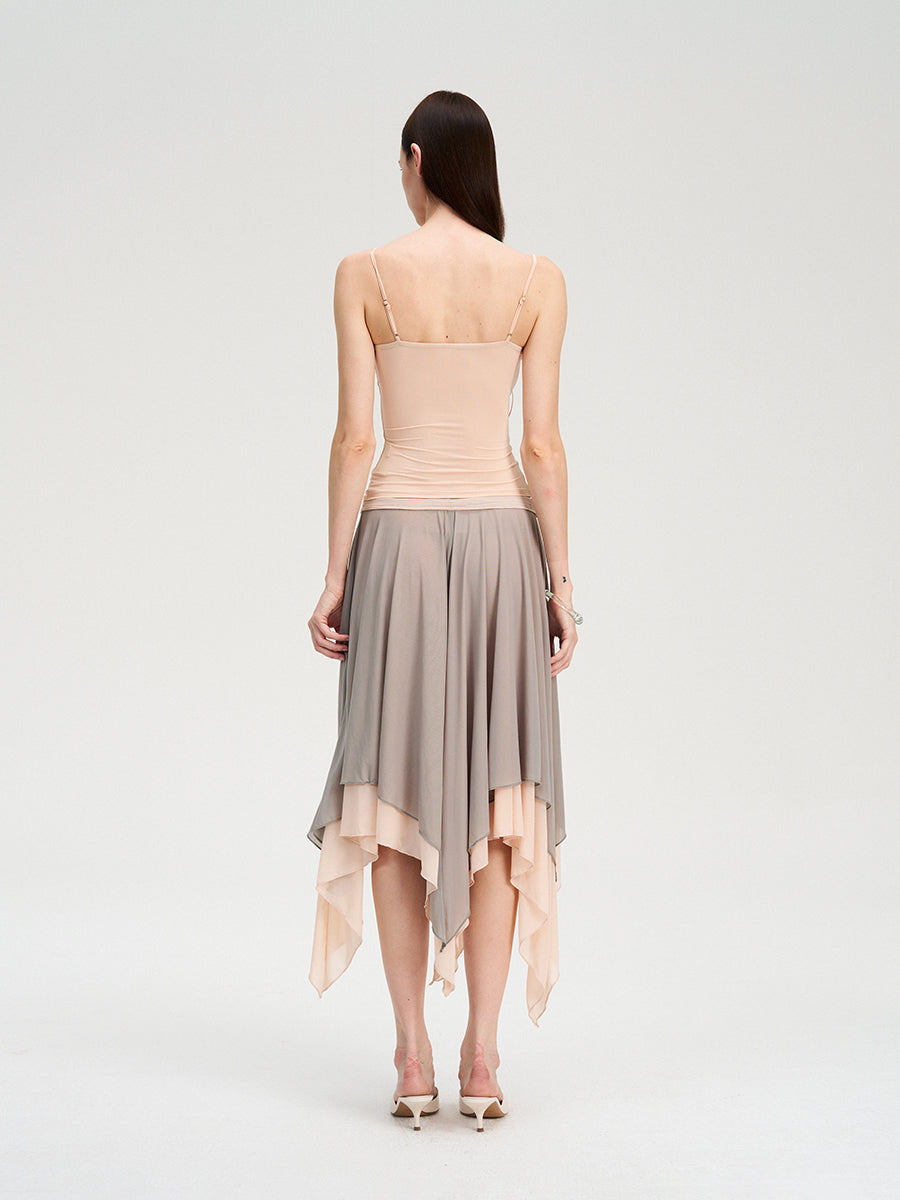 Dotyears Mesh panels contrast with fluttery maxi skirts