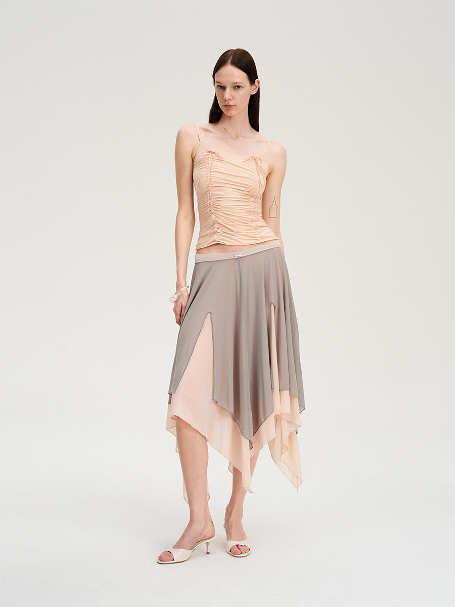 Dotyears Mesh panels contrast with fluttery maxi skirts