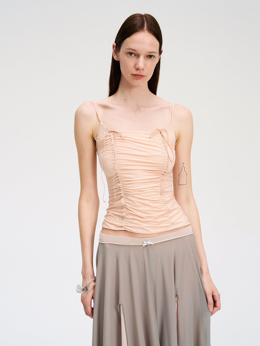 Dotyears Mesh panels contrast with fluttery maxi skirts