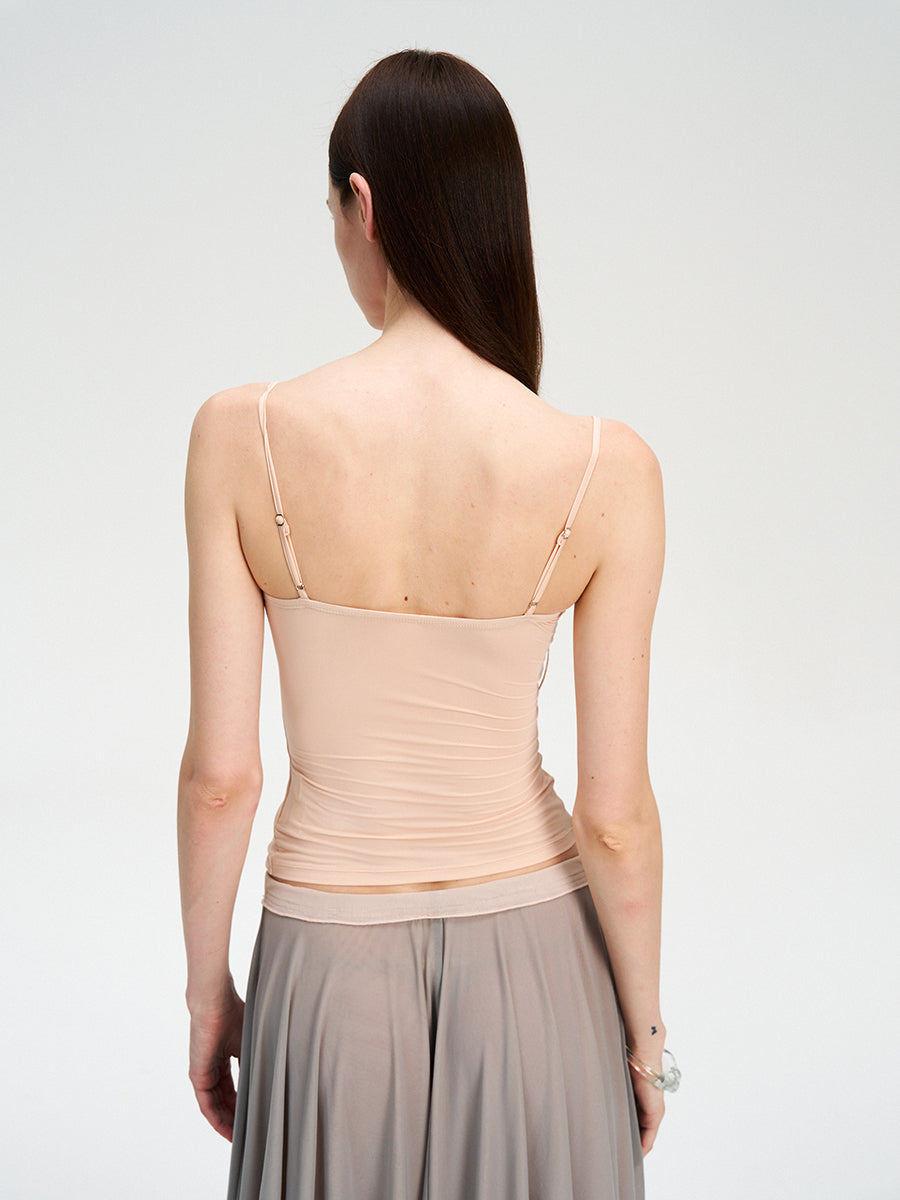 Dotyears Mesh panels contrast with fluttery maxi skirts