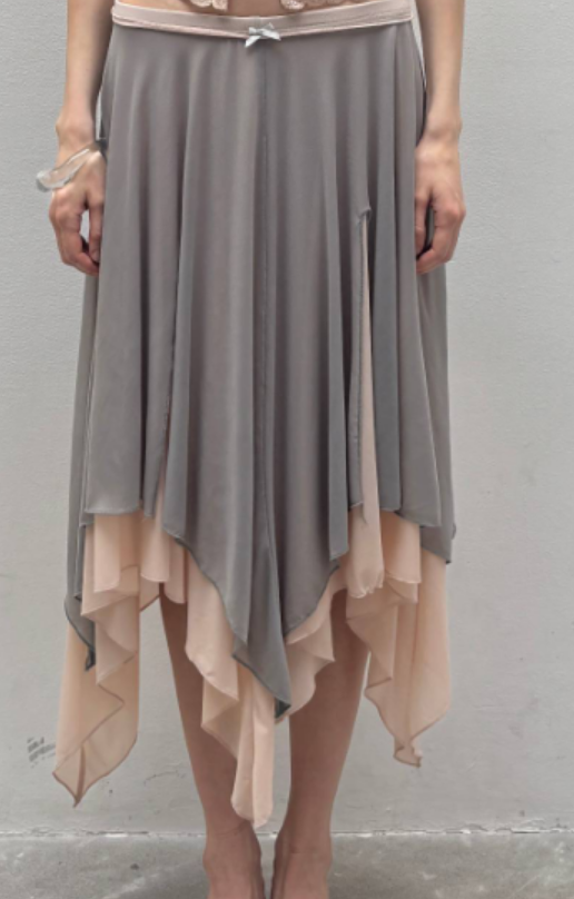 Dotyears Mesh panels contrast with fluttery maxi skirts