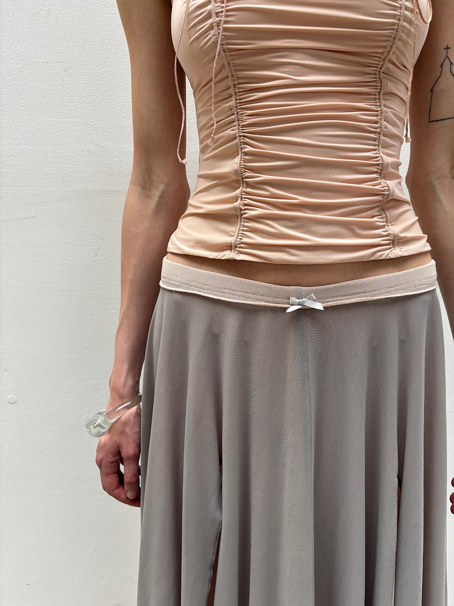 Dotyears Mesh panels contrast with fluttery maxi skirts